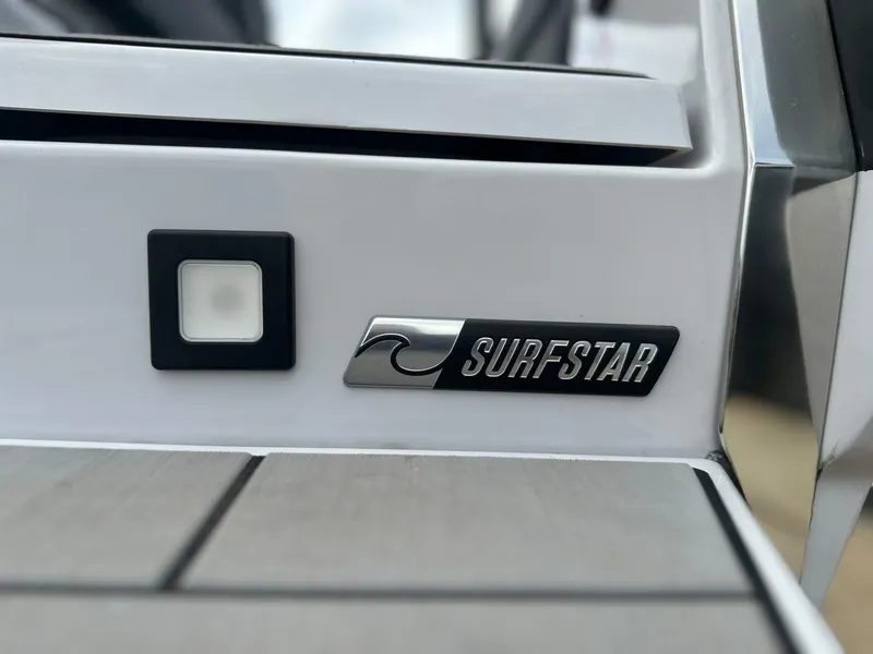 Slide: The Image of 2024 Aviara AV28 boat with Surfstar logo and deck detail. - 8
