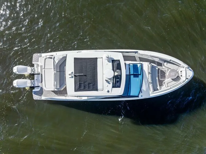 Slide: The Image of Aerial view of 2023 Sea Ray SLX 400 OB luxury boat on water. - 43