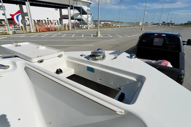 Slide: The Image of 2009 Sailfish 2860 CC boat on trailer in parking lot near Carnival terminal. - 10