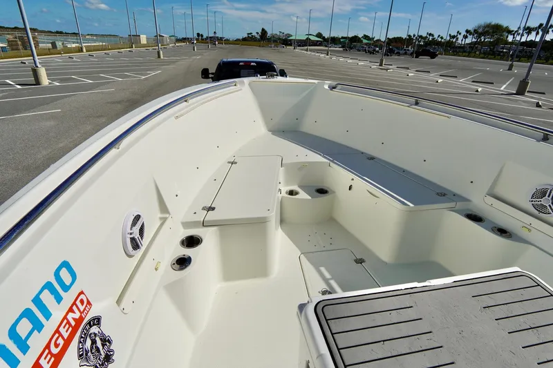 Slide: The Image of 2009 Sailfish 2860 CC boat interior in a parking lot. - 11