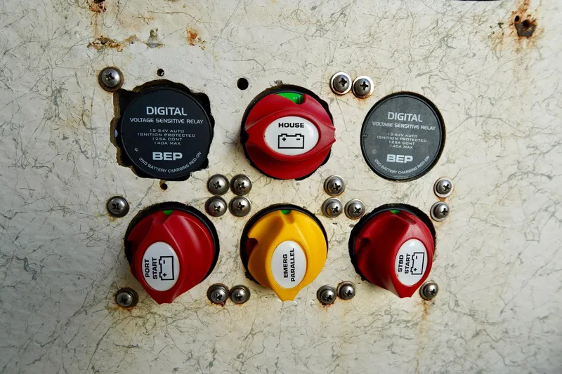 Slide: The Image of Control panel with switches on a 2009 Sailfish 2860 CC boat. - 23