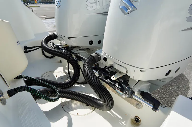 Slide: The Image of Twin Suzuki outboard engines on a 2009 Sailfish 2860 CC boat. - 35