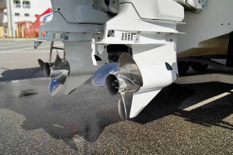 Slide: The Image of Twin outboard motors on a 2009 Sailfish 2860 CC boat, close-up view. - 39
