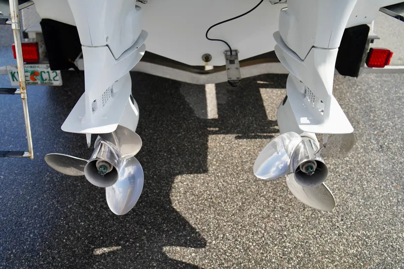 Slide: The Image of Twin propellers of a 2009 Sailfish 2860 CC boat on a trailer. - 41