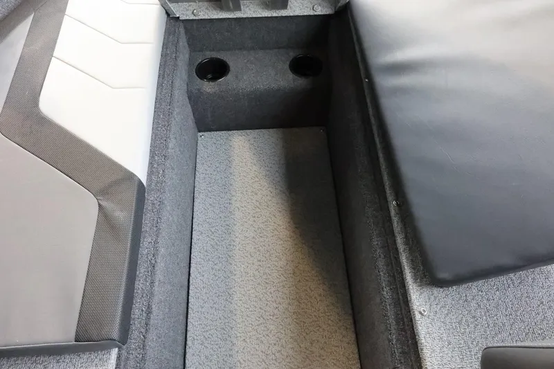 Slide: The Image of 2025 Lowe Fish & Ski FS 1625 interior seating with cup holders. - 19