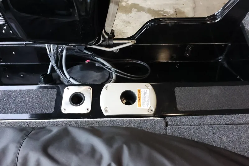 Slide: The Image of 2025 Lowe Fish & Ski FS 1625 boat interior with wiring and mounting points. - 23