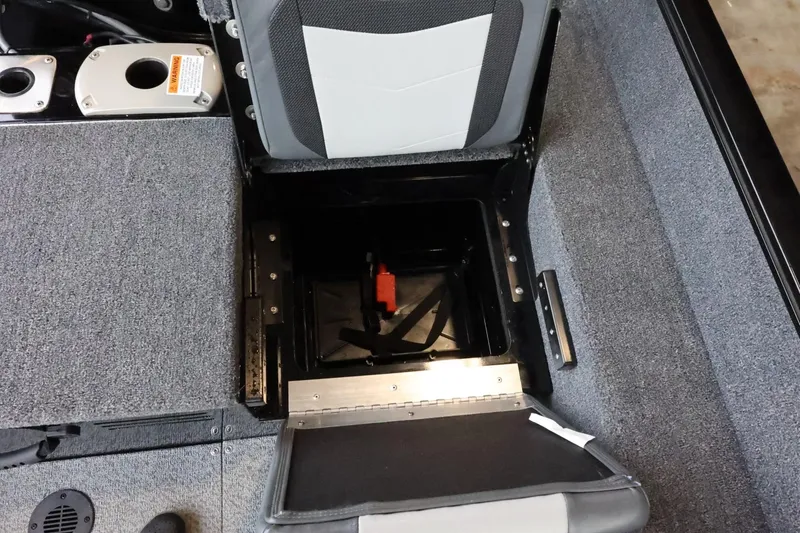 Slide: The Image of 2025 Lowe Fish & Ski FS 1625 boat interior storage compartment with open seat. - 27