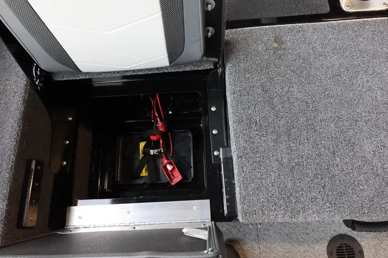 Slide: The Image of Lowe Fish & Ski FS 1625 boat interior showing battery compartment, 2025 model. - 28