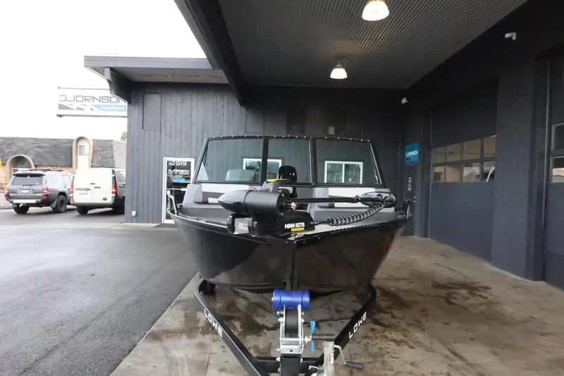 Slide: The Image of 2025 Lowe Fish & Ski FS 1625 boat on trailer at dealership. - 3