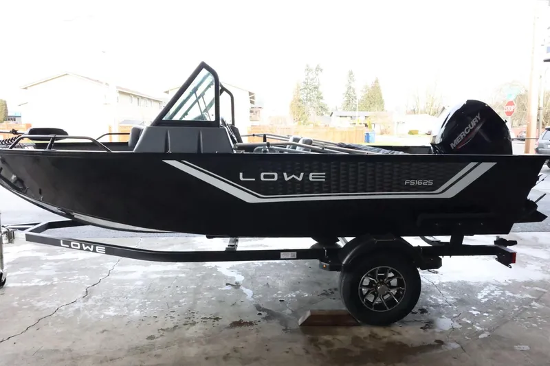 Slide: The Image of 2025 Lowe Fish & Ski FS 1625 boat on trailer, side view. - 5