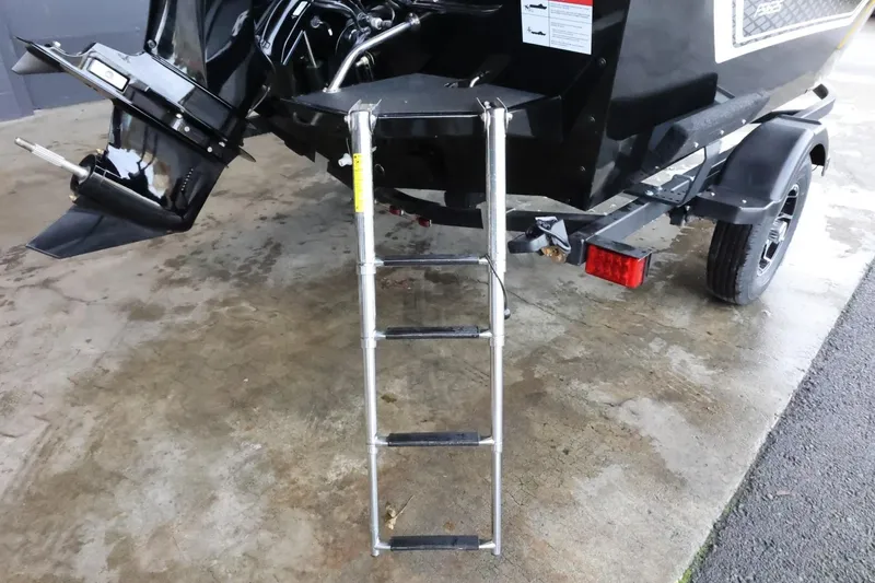 Slide: The Image of Lowe Fish & Ski FS 1625 boat ladder, 2025 model, on a trailer. - 9