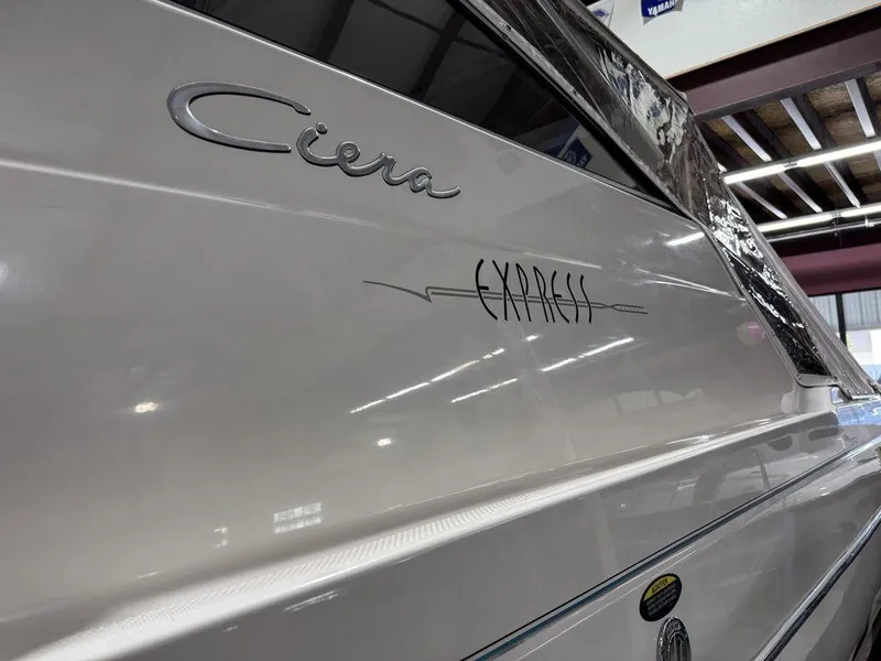 Slide: The Image of Bayliner 2252 Ciera Express boat, 2000 model, close-up of exterior branding. - 10