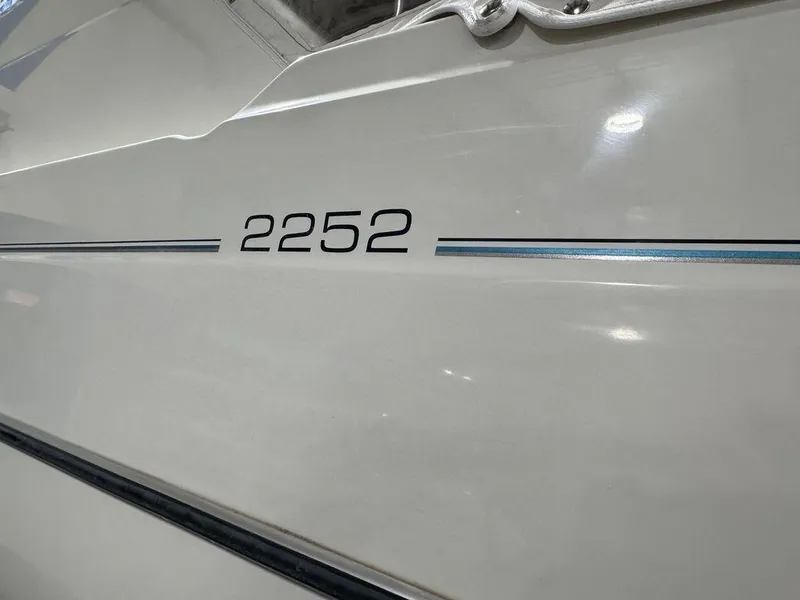 Slide: The Image of Bayliner 2252 Ciera Express 2000 model boat exterior with sleek design. - 12