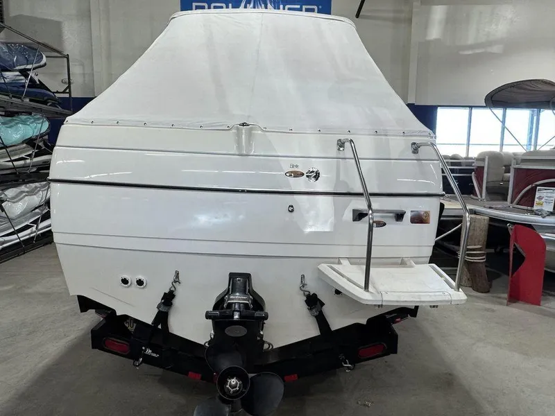 Slide: The Image of 2000 Bayliner 2252 Ciera Express boat in indoor storage, rear view. - 16
