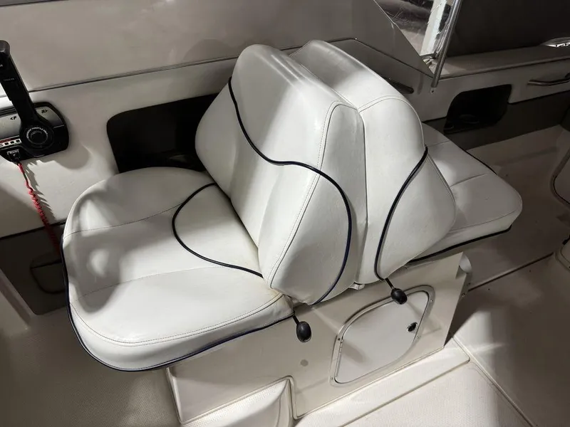 Slide: The Image of White seating in 2000 Bayliner 2252 Ciera Express boat interior. - 41