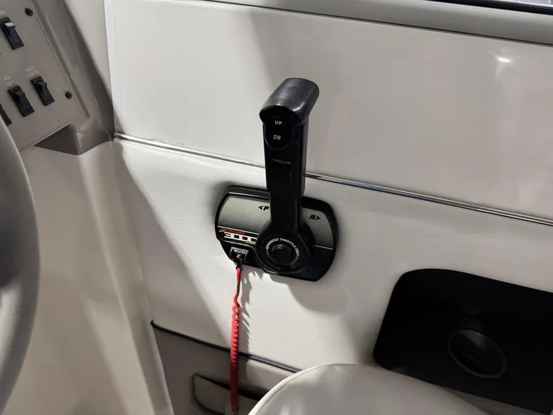 Slide: The Image of Close-up of throttle control on 2000 Bayliner 2252 Ciera Express boat. - 48