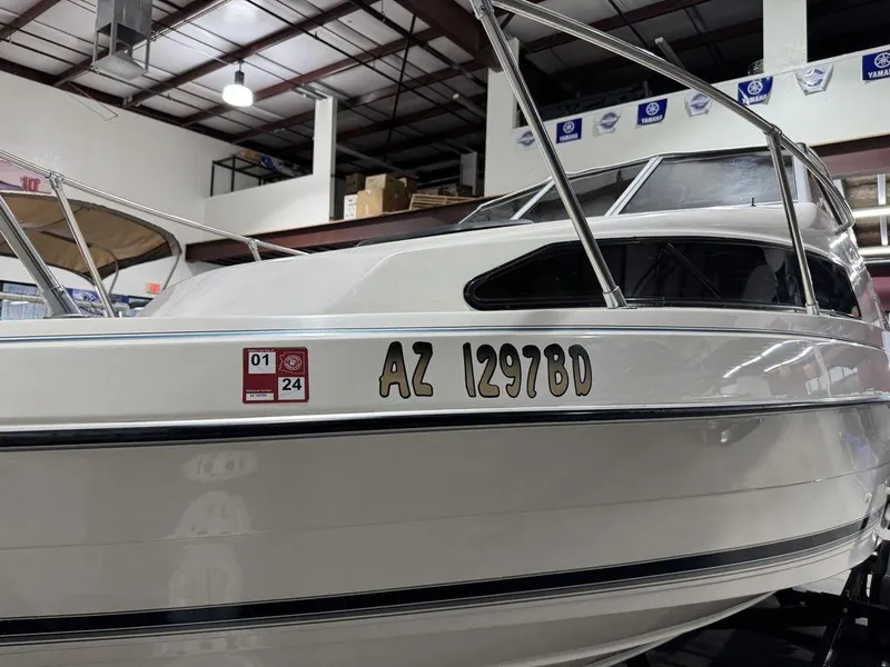 Slide: The Image of 2000 Bayliner 2252 Ciera Express boat in indoor storage facility. - 8
