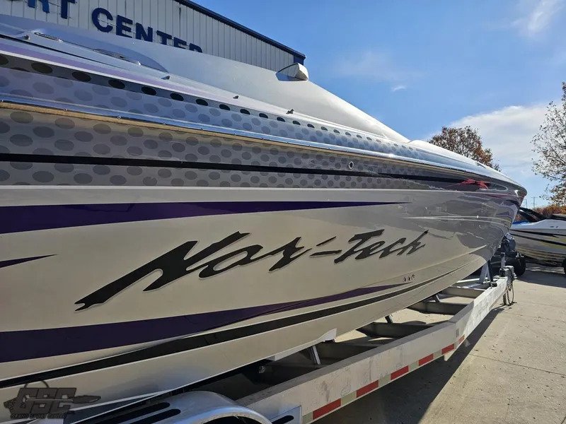 Slide: The Image of 2007 Nor-Tech 3900 Super-VEE boat on trailer, side view with branding. - 14
