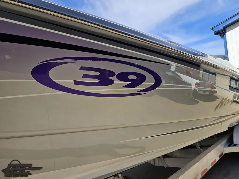 Slide: The Image of 2007 Nor-Tech 3900 Super-VEE boat with "39" decal on the side. - 18