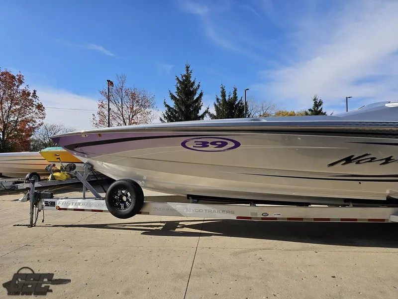 Slide: The Image of 2007 Nor-Tech 3900 Super-VEE boat on trailer under clear blue sky. - 20