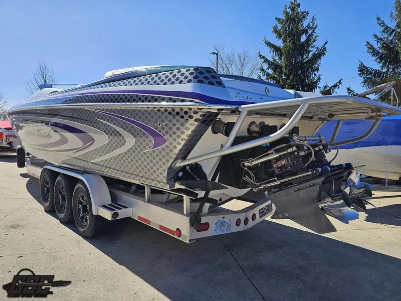 Slide: The Image of 2007 Nor-Tech 3900 Super-VEE boat on trailer, showcasing sleek design and powerful engine. - 28