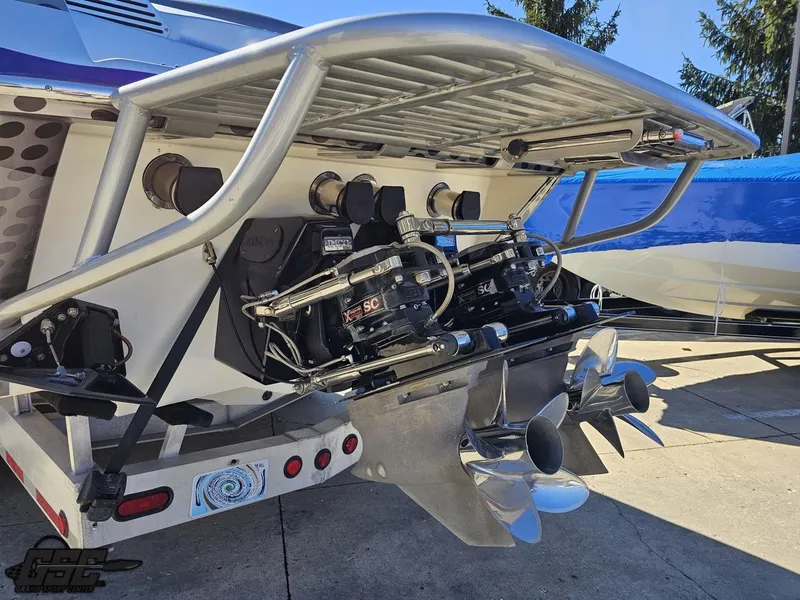 Slide: The Image of 2007 Nor-Tech 3900 Super-VEE boat with dual propellers and powerful engine setup. - 30