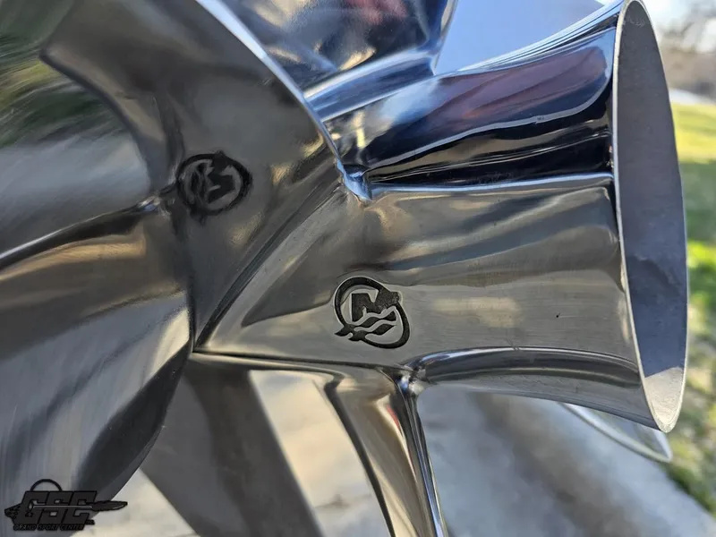 Slide: The Image of Close-up of a polished propeller blade on a 2007 Nor-Tech 3900 Super-VEE boat. - 31