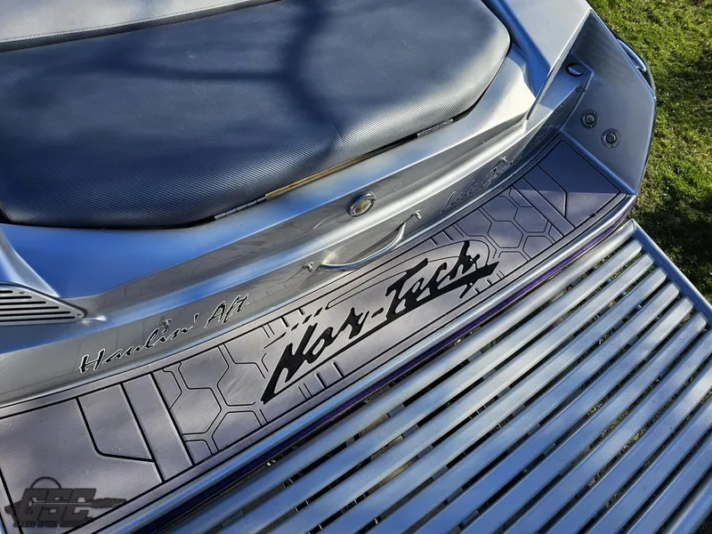 Slide: The Image of 2007 Nor-Tech 3900 Super-VEE boat deck with logo and seating area. - 34