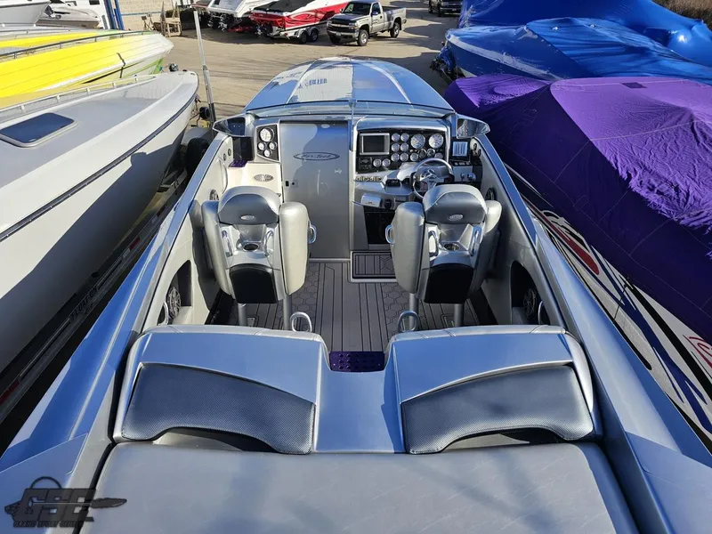 Slide: The Image of 2007 Nor-Tech 3900 Super-VEE boat interior with dual seats and control panel. - 39