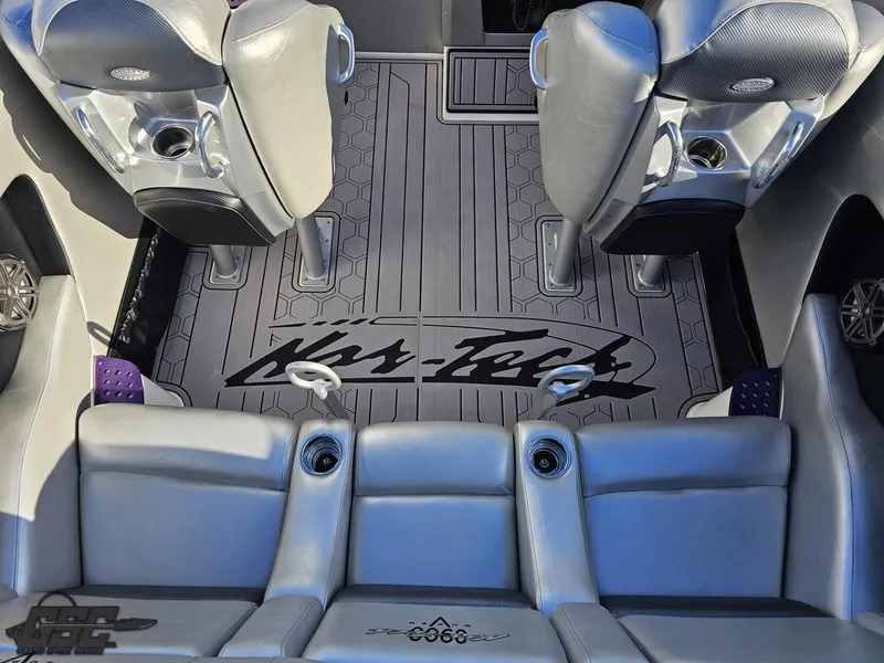 Slide: The Image of 2007 Nor-Tech 3900 Super-VEE interior with gray seating and custom flooring. - 42