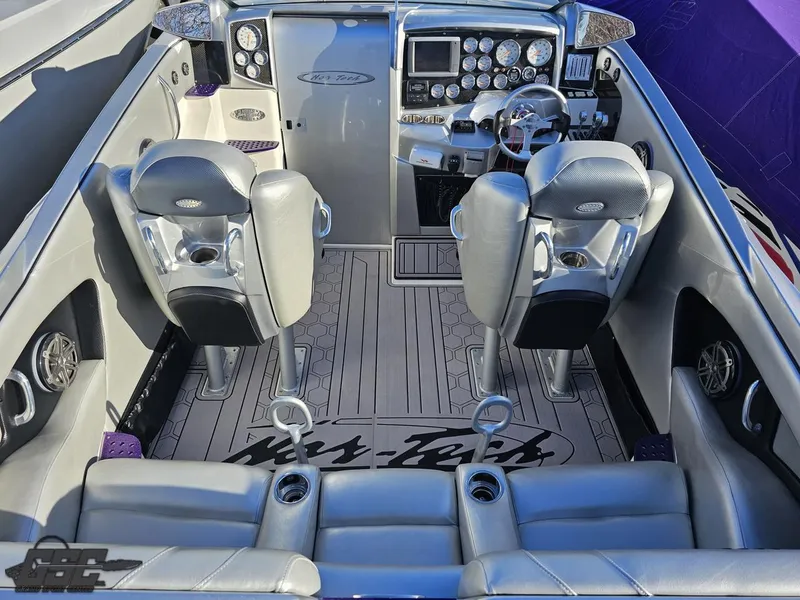 Slide: The Image of 2007 Nor-Tech 3900 Super-VEE boat interior with sleek seating and advanced dashboard controls. - 43