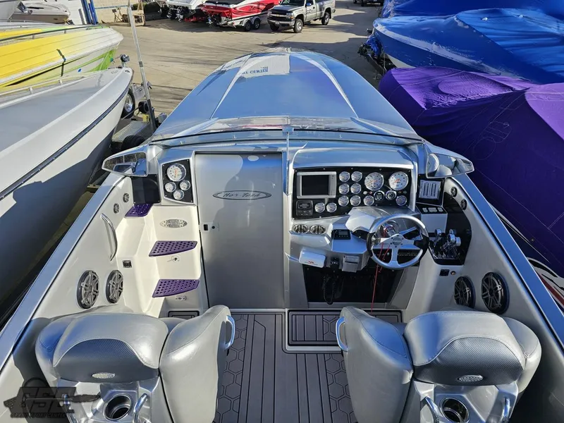 Slide: The Image of 2007 Nor-Tech 3900 Super-VEE boat cockpit with modern controls and seating. - 44