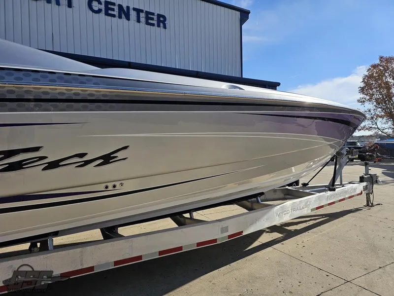 Slide: The Image of 2007 Nor-Tech 3900 Super-VEE boat on trailer at a marine center. - 6