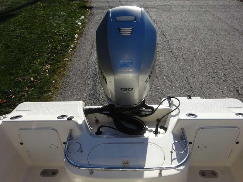 Slide: The Image of 2006 Key West 186 Sportsman boat with 150 HP outboard motor. - 10