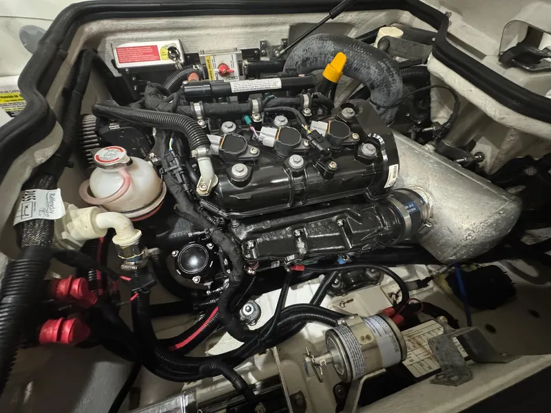 Slide: The Image of Engine compartment of a 2020 Williams Jet Tenders Sportjet 345, showcasing intricate mechanical components. - 10