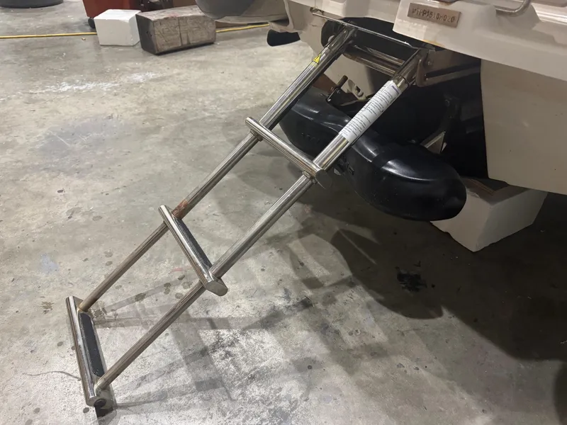 Slide: The Image of Stainless steel ladder on 2020 Williams Jet Tenders Sportjet 345 in a garage. - 16