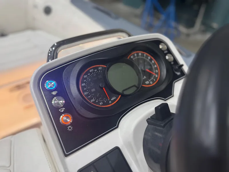 Slide: The Image of Dashboard of 2020 Williams Jet Tenders Sportjet 345 with illuminated gauges and controls. - 18