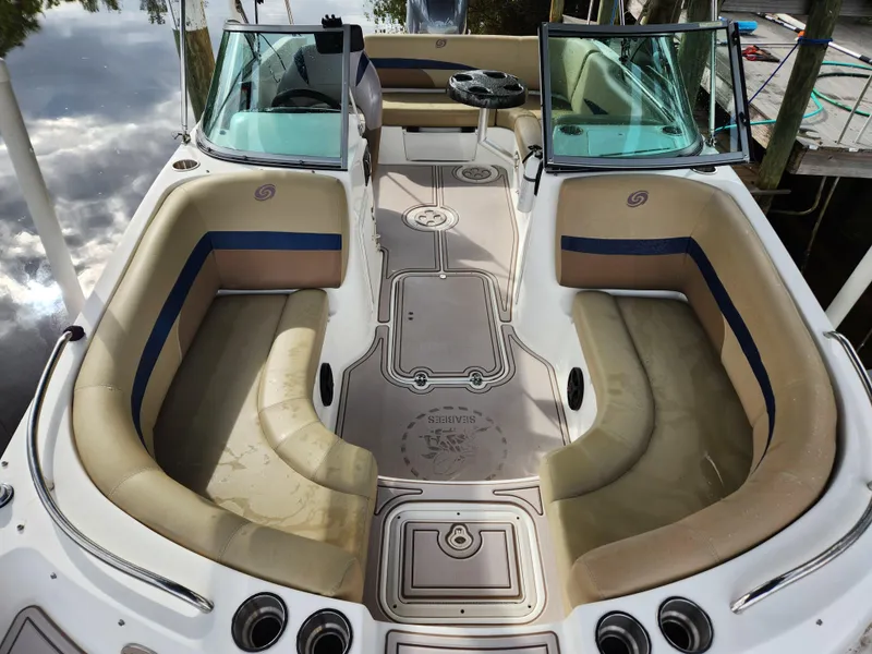 Slide: The Image of 2019 Hurricane SunDeck 187 OB boat interior with spacious seating and modern design. - 12