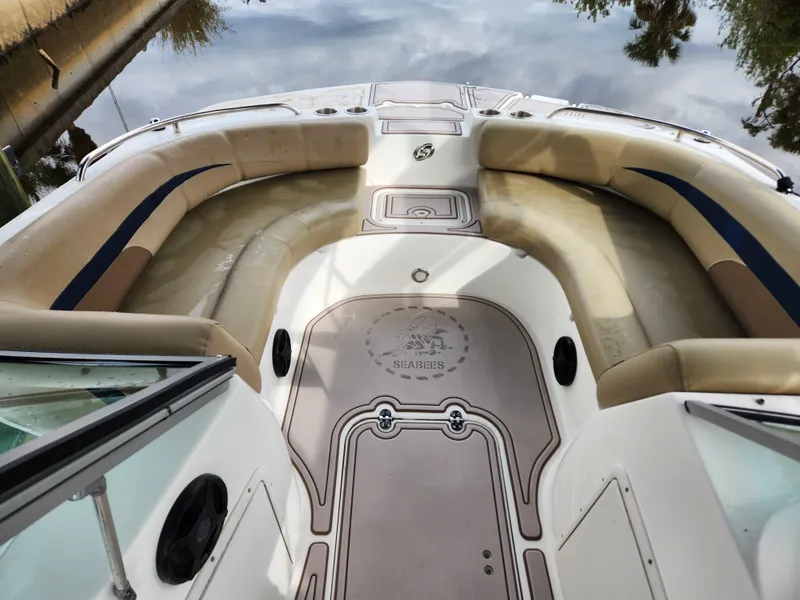 Slide: The Image of 2019 Hurricane SunDeck 187 OB boat interior with beige seating and sleek design. - 8
