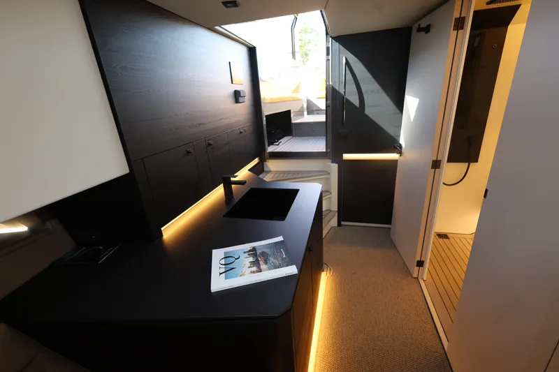Slide: The Image of Luxurious interior of 2023 Vanquish Yachts VQ45 with modern design and ambient lighting. - 17