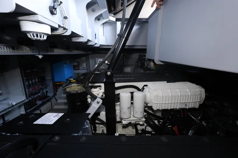 Slide: The Image of Engine room of 2023 Vanquish Yachts VQ45, showcasing mechanical components and systems. - 22