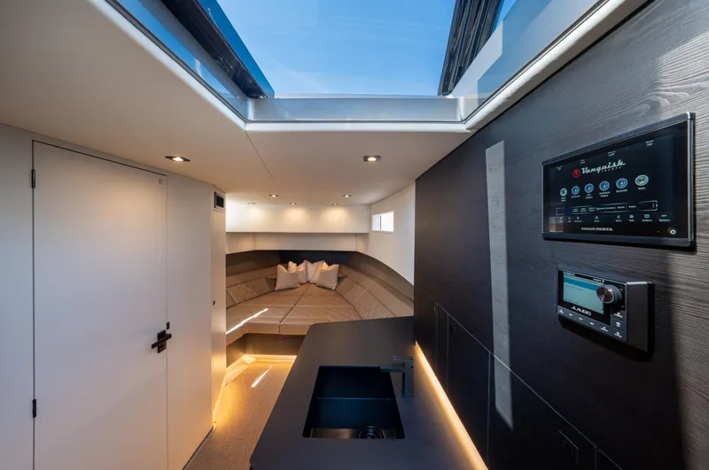 Slide: The Image of Luxurious interior of 2023 Vanquish Yachts VQ45 with modern design and advanced controls. - 29