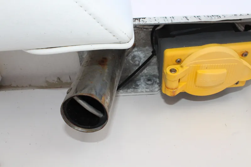 Slide: The Image of Close-up of a 2006 Pro-Line 32 Express boat exhaust and electrical outlet. - 21