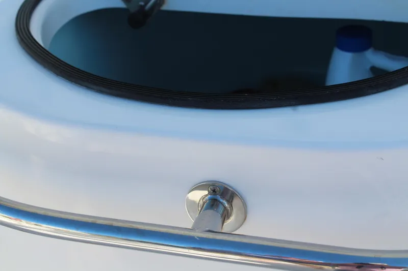 Slide: The Image of Close-up of 2006 Pro-Line 32 Express boat detail with railing and hatch. - 28