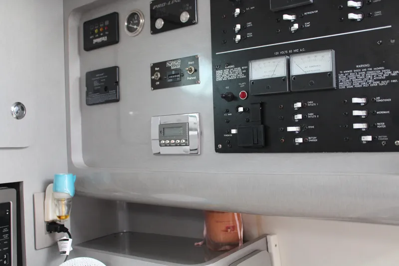Slide: The Image of Control panel of a 2006 Pro-Line 32 Express boat interior. - 40