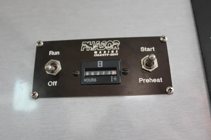 Slide: The Image of Phasor Marine control panel with hour meter on 2006 Pro-Line 32 Express boat. - 49