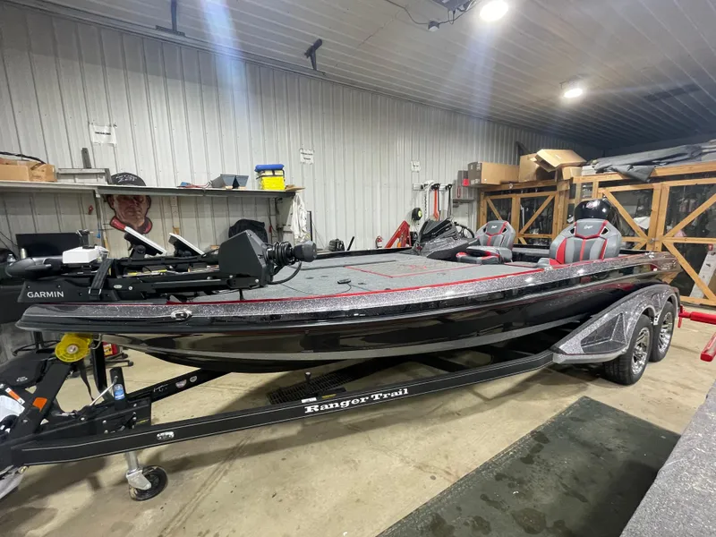 The Image of 2025 Ranger Z521R Cup-Equipped boat in a garage, featuring advanced fishing equipment. - 0
