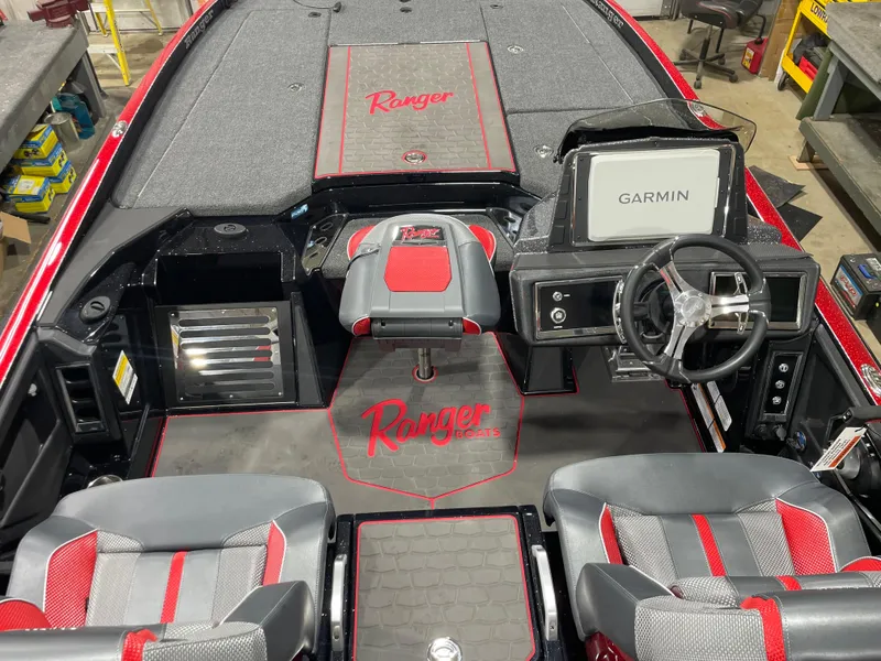 Slide: The Image of 2025 Ranger Z521R Cup-Equipped boat interior with Garmin navigation system and stylish seating. - 5
