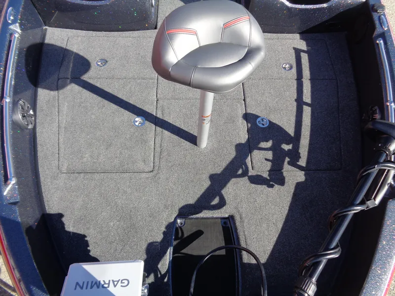 Slide: The Image of 2025 Nitro ZV19 Sport Pro boat interior with Garmin equipment and seating. - 13