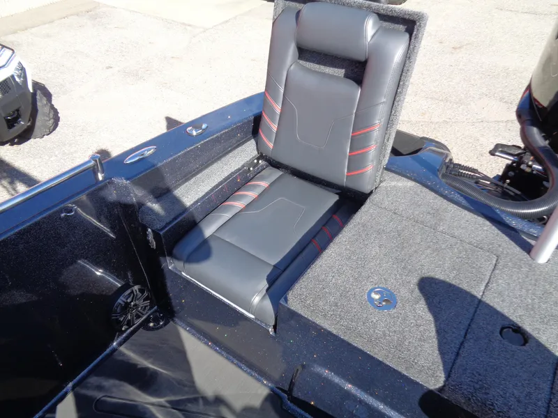 Slide: The Image of 2025 Nitro ZV19 Sport Pro boat seat with sleek black and red design. - 15